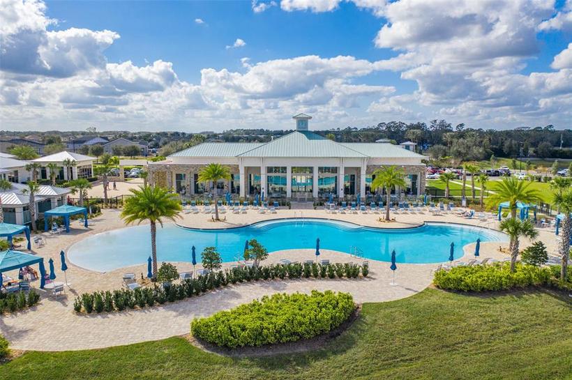 Commercial pool service technician at a Florida resort pool